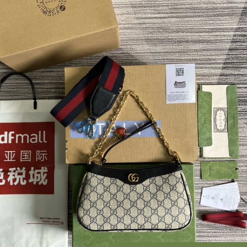 G*u*i top handle bags